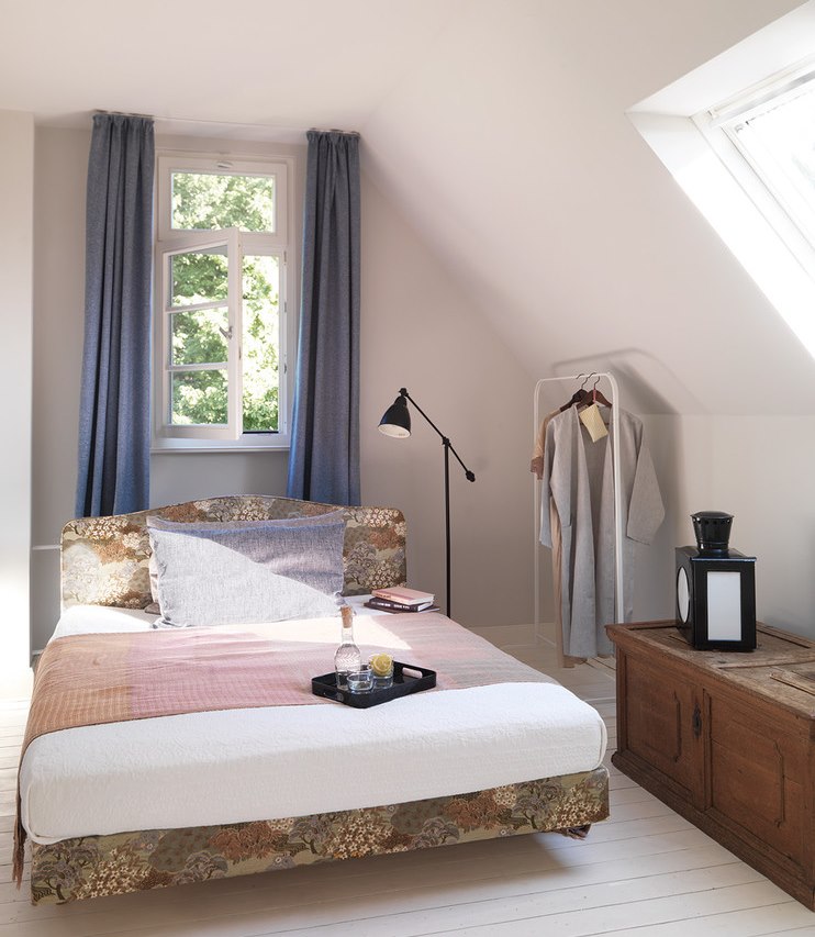 Cintre ouvert dans la chambre mansardée