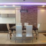 Large kitchen with wenge furniture and white glossy cabinets
