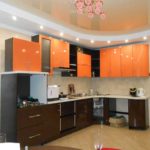 Orange kitchen design with wenge