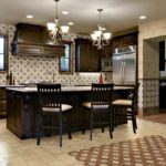 Classical kitchen furniture in wenge color and unusual tiles with ornaments for decorating the kitchen