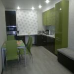 Combination of green and wenge furniture in a gray room