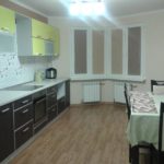 Wenge furniture for bright kitchen with bay window