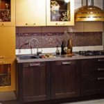 Lovely wenge kitchen with art nouveau gold