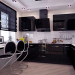 Kain hitam yang bergaya untuk dapur dengan perabot hitam