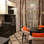 Bright kitchen with dark wenge furniture