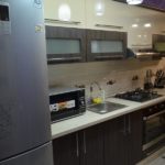 Bright warm colors in the kitchen complement well the rich color of wenge