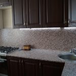 Dark wenge kitchen and marble countertop and apron - unusual and bold