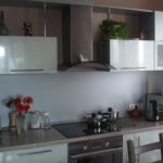 Gray kitchen with induction hob