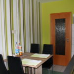 Colorful stripes on the wallpaper in the kitchen