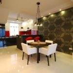 Kitchen design with dark wallpaper