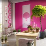 Palm tree in the background against a bright wall decoration