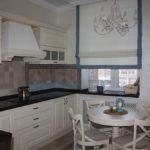 Roman curtain on the kitchen window