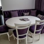 Oval table in the set of kitchen corner