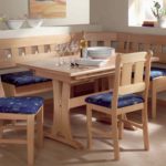 Wine glasses on a dining table made of chipboard