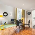 Black chairs on a wooden floor