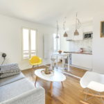 Design of a kitchen-living room in white