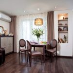 Brown furniture on a dark floor