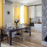 Yellow curtains in the interior of the kitchen