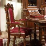 Carved legs of a dining chair