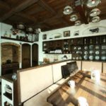 Dark ceiling made of larch boards