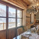 Rustic chandelier in a rustic kitchen