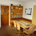 Wicker chairs at the kitchen table