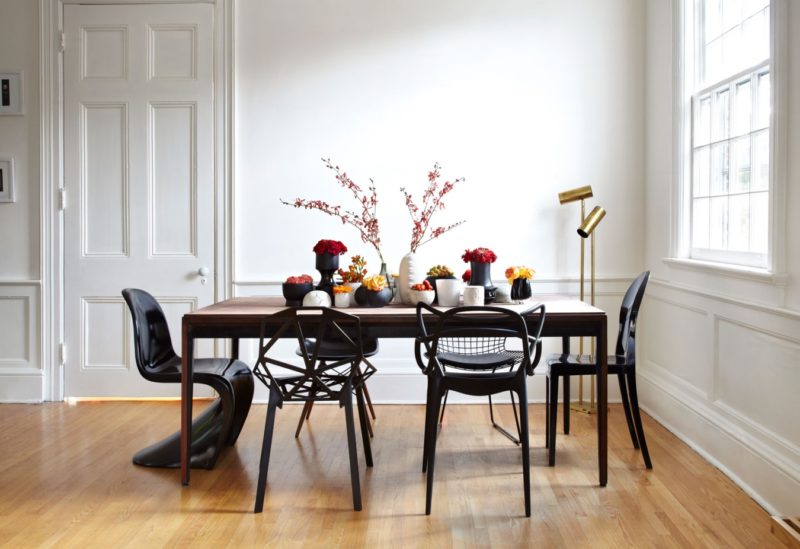 Dining group with wooden furniture in a white kitchen