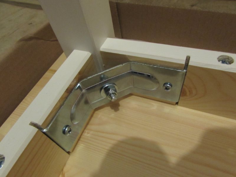 Metal bracket on the underside of the kitchen table