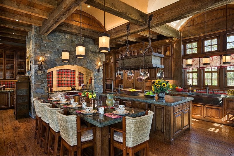 Wooden dining table in the kitchen with fireplace