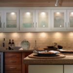 Beautiful lighting in the interior of kitchen cabinets