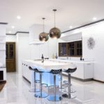 Snow-white kitchen with a glossy floor