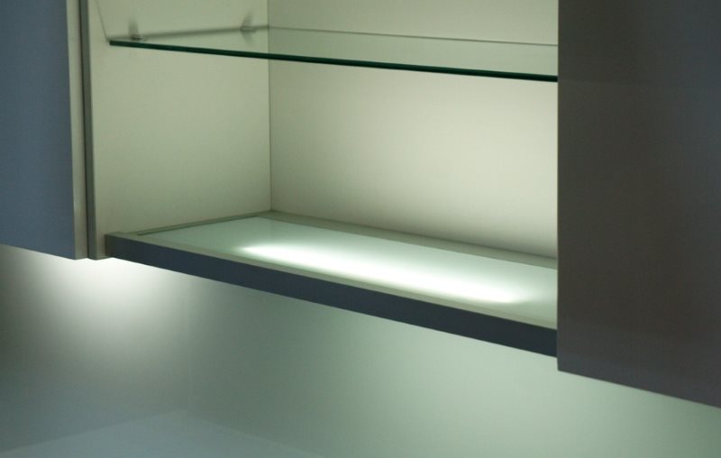 Glass shelf of the cabinet with decorative lighting