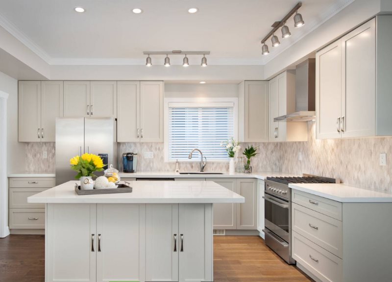 Swivel slots on the white kitchen ceiling