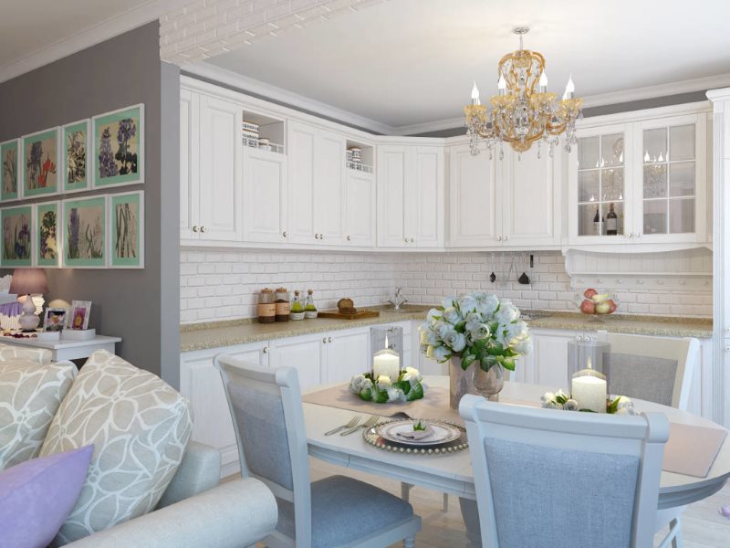 Mobilier blanc dans la zone de travail de la cuisine-salon dans le style de la Provence