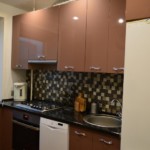 Small tiles on a kitchen apron