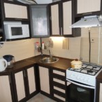 Black and white facades of a kitchen set