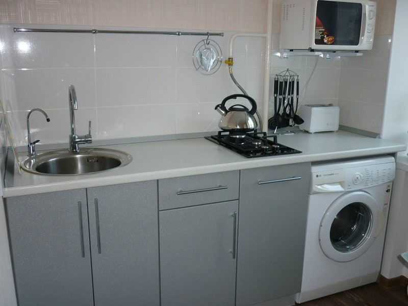 Gray facades of linear kitchen