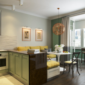 Multi-colored curtains on the window of the kitchen-living room