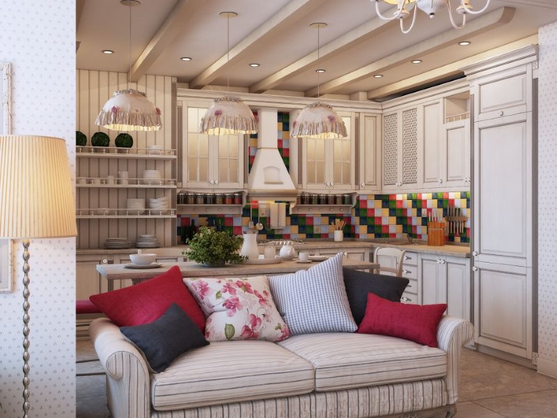 Multi-colored pillows on the sofa in the kitchen-living room