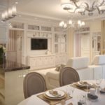 Λευκός καναπές στο κέντρο της κουζίνας-σαλόνι