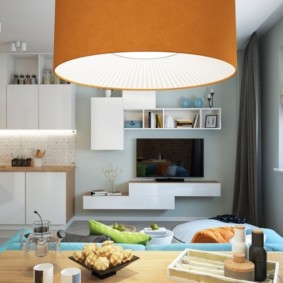 Roman curtains on the window of the kitchen-living room