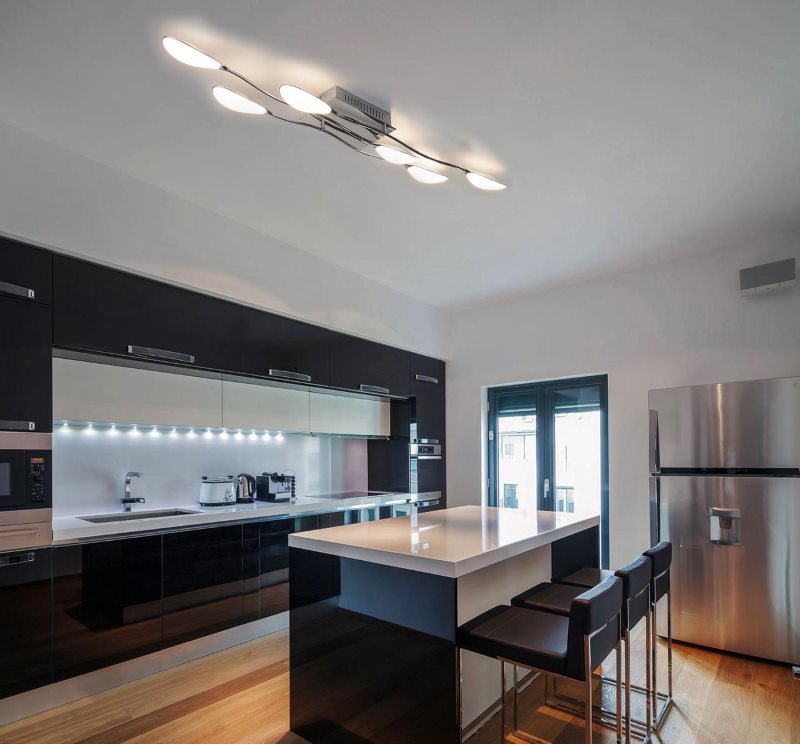 Line set in the working area of the high-tech kitchen-living room