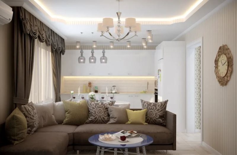 The design of the kitchen-living room in the neoclassical style