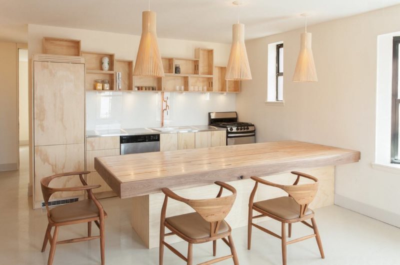 Wooden furniture in an eco-style kitchen