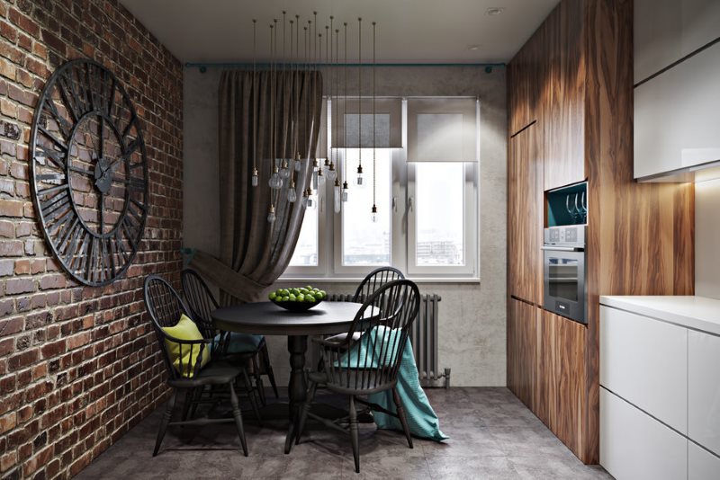 Parede de tijolos na cozinha com um conjunto linear