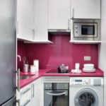 La machine à laver dans le coin