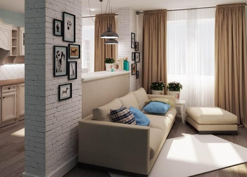 Photos in black frames on a white brick wall