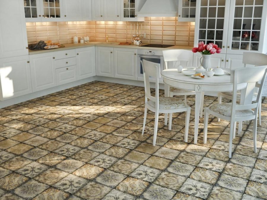 Kitchen design with stone tiles on the floor