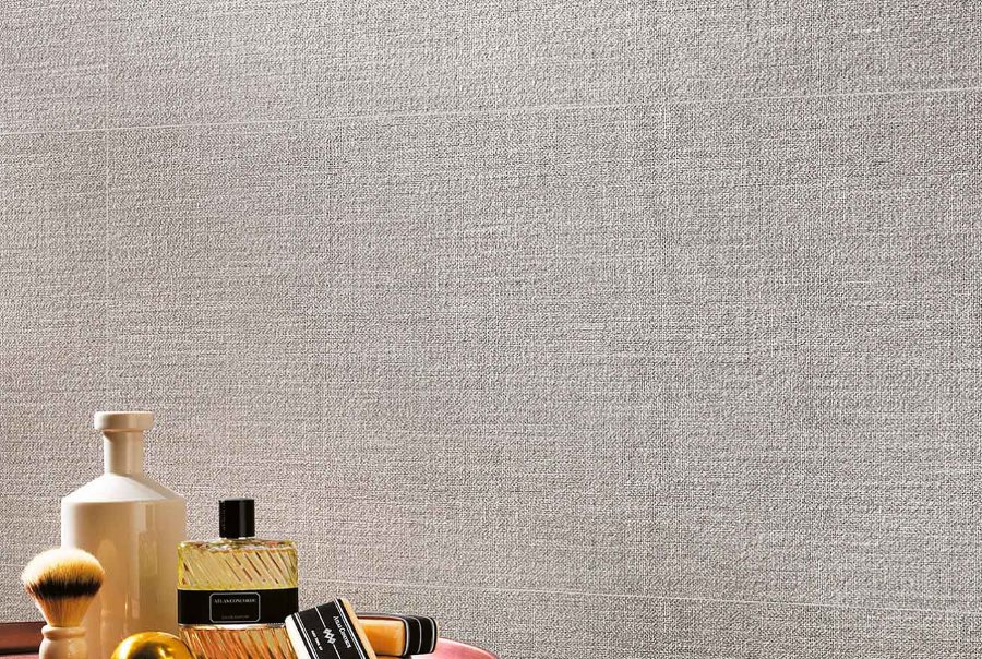 Ceramic tile under the fabric on the kitchen wall