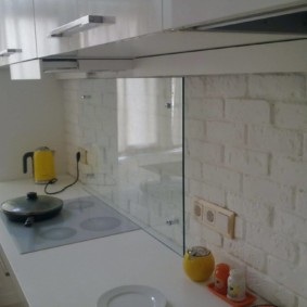 Vidro temperado em um avental de cozinha